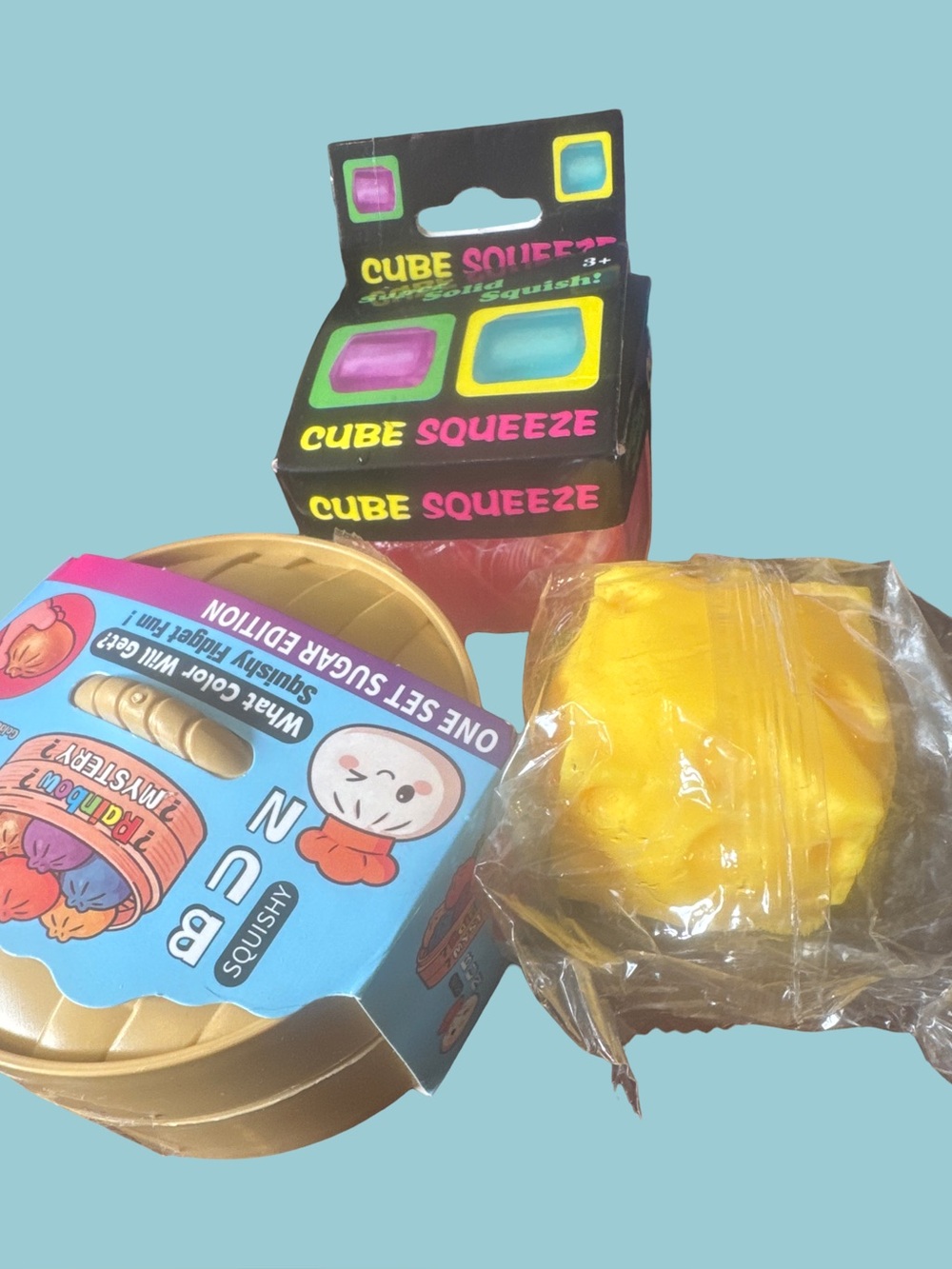 Squeeze Yellow Cube Squeeze Party Favor by Squeeze